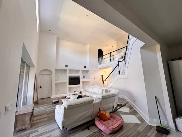 Bright open-concept interior with fresh white walls and a clean finished look across the main living space